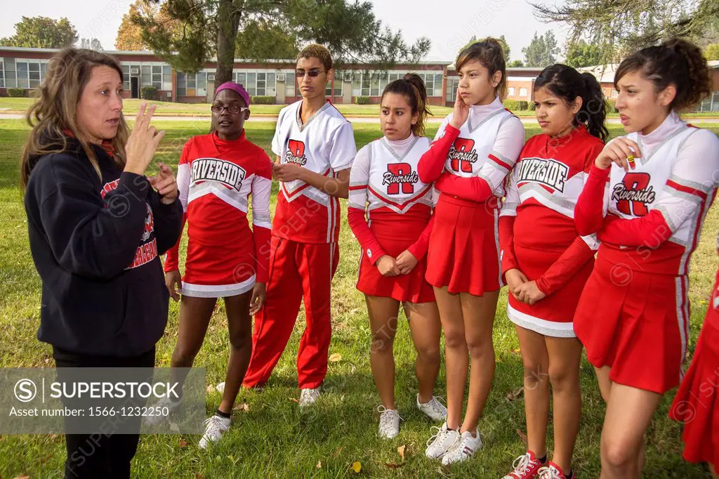 The coach of a multiethnic team of deaf cheerleaders trains them using sign language at the California School for the Deaf in Riverside, CA A deaf His...