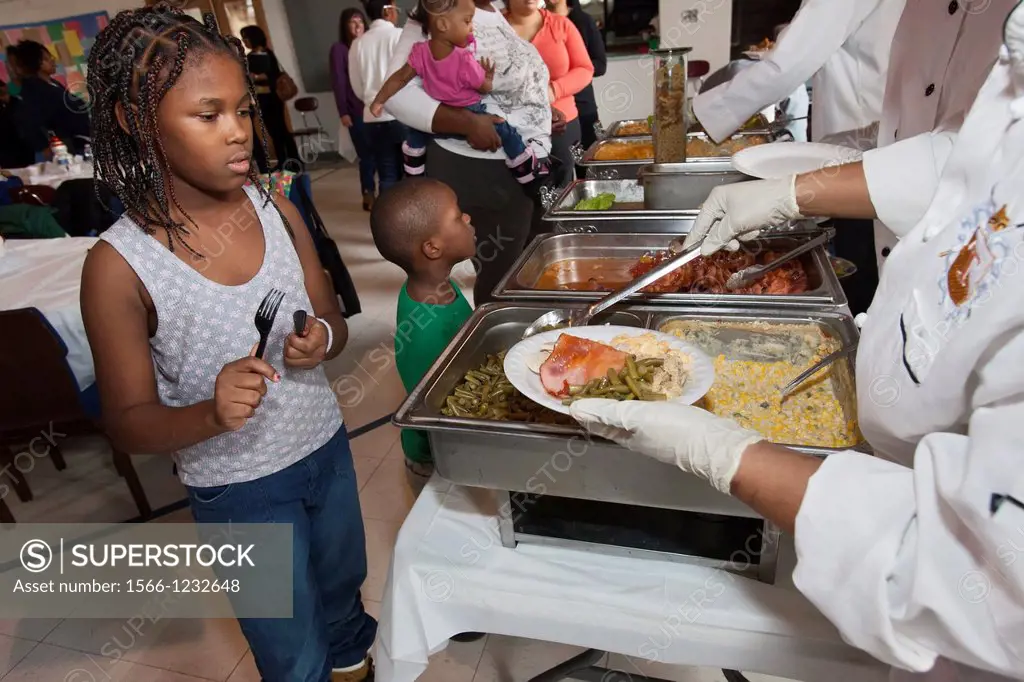 Detroit, Michigan - A meal is served to residents of a Salvation Army shelter for homeless women and children