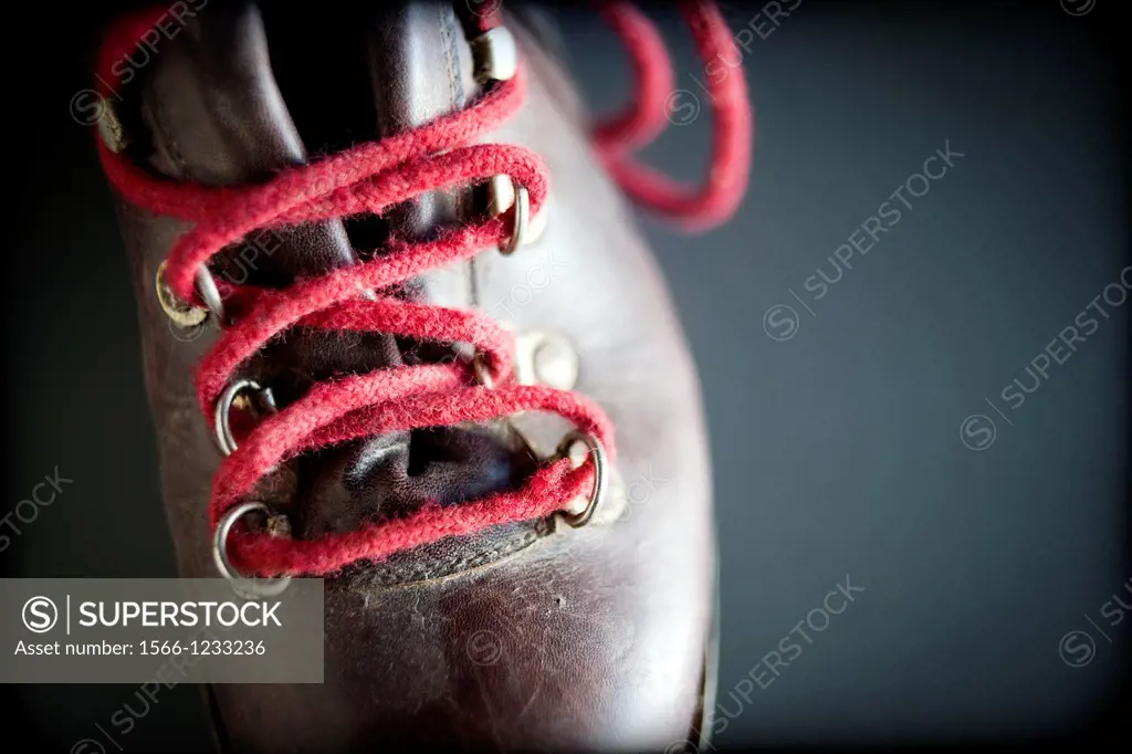 classic mountain boot with red laces,