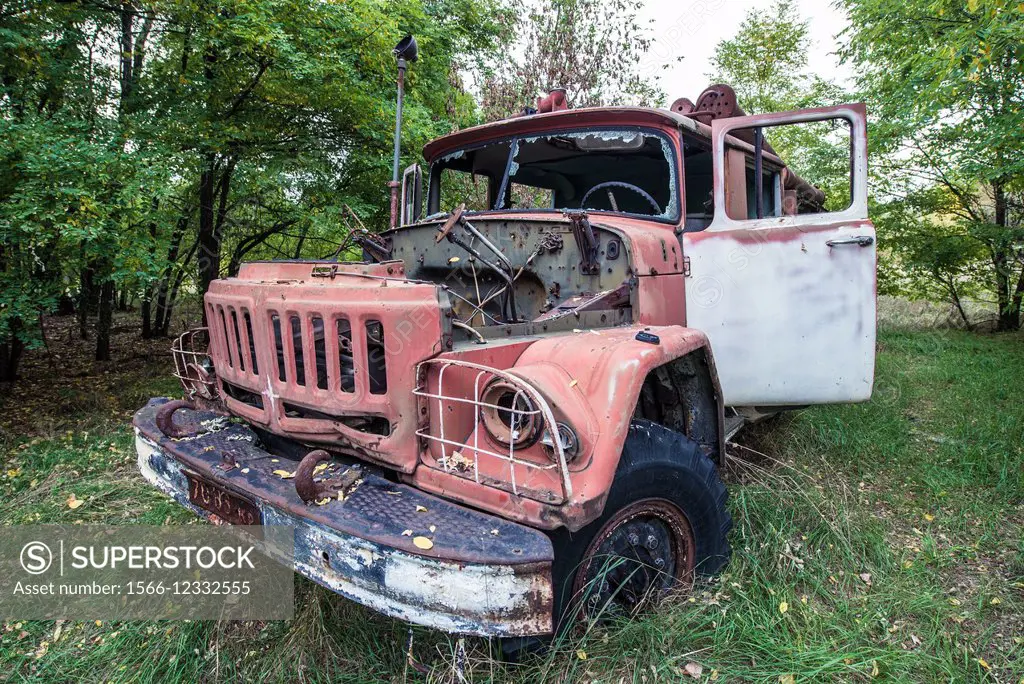 abandoned fire engine near former fish plant in Chernobyl Exclusion Zone, Ukraine.