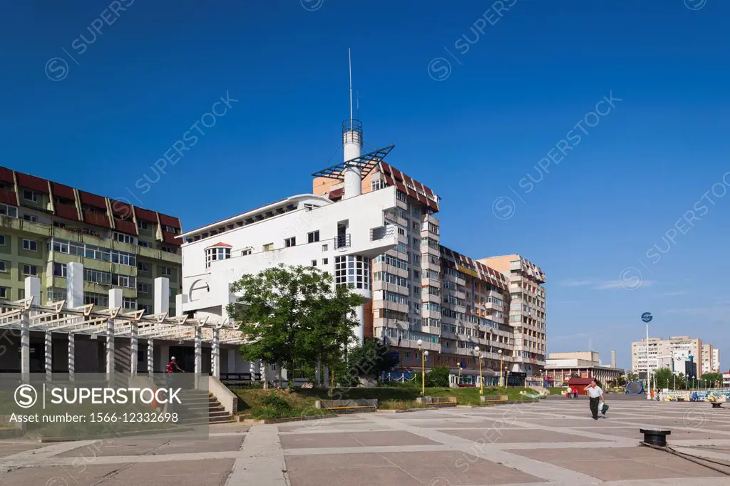 Romania, Danube River Delta, Tulcea, waterfront buildings by Danube River.
