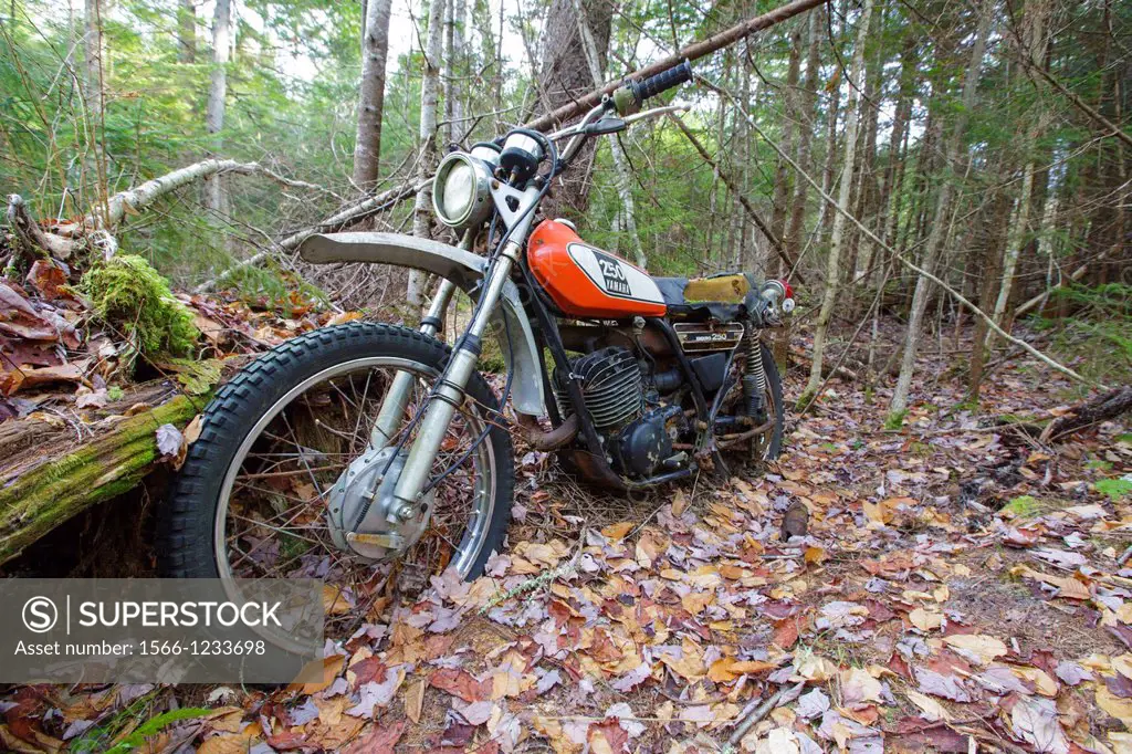 Abandoned Yamaha 250 motorcycle near the Mt Cilley Trail in Woodstock, New Hampshire USA