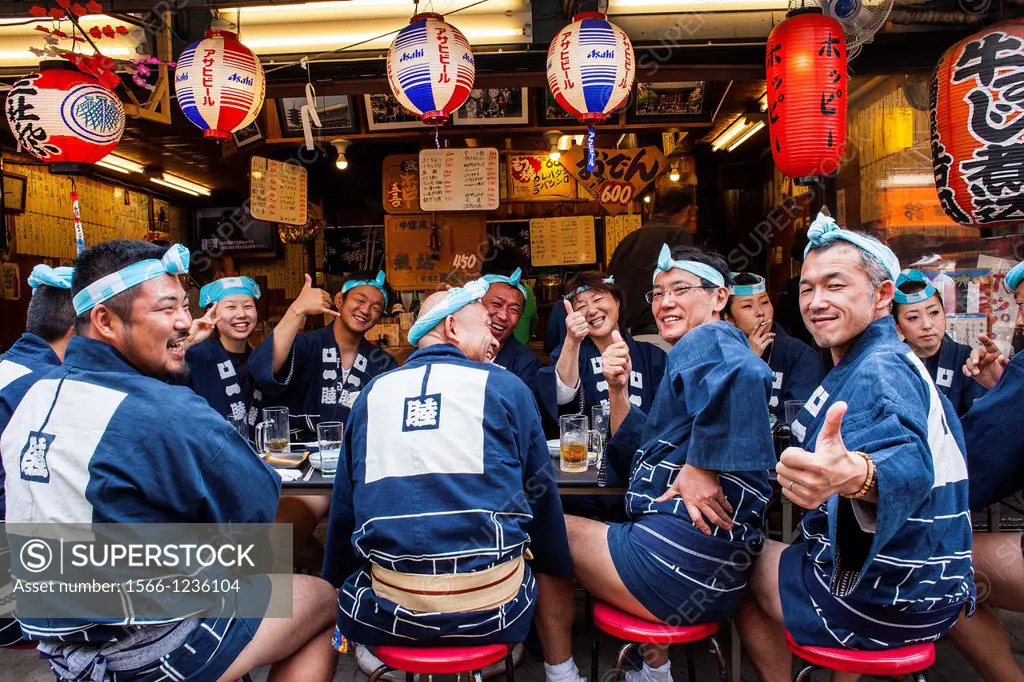 Bearers of Mikoshi eating in restaurant,during Sanja Matsuri Festival, in 2 chome street, Asakusa, Tokyo, Japan, Asia