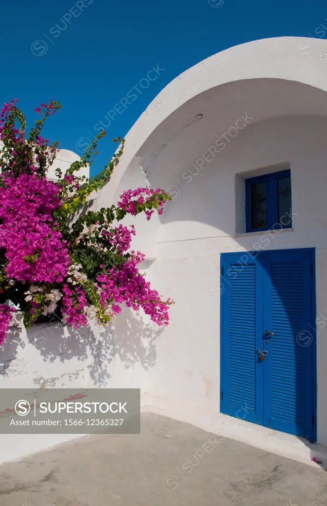 Close up of doorway and flowers in Santorini Greece in Greek Islands
