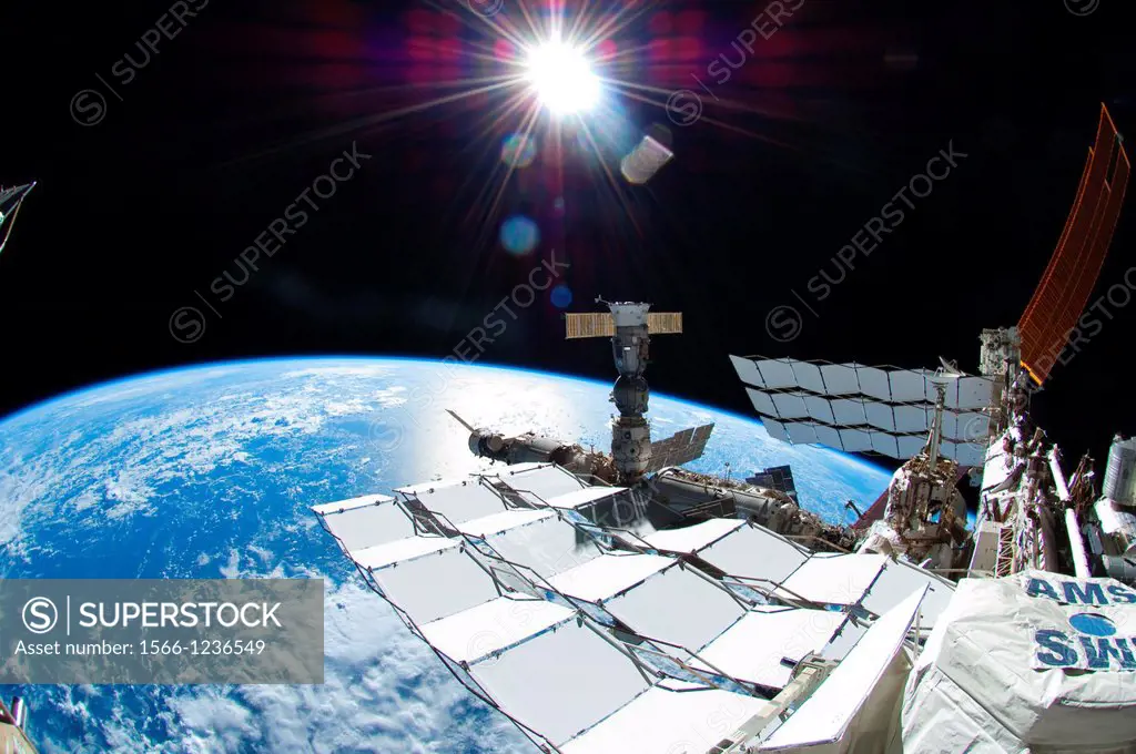 ISS028-E-016140 12 July 2011 --- This picture, photographed by NASA astronaut Ron Garan during the spacewalk conducted on July 12, 2011, shows the sun...