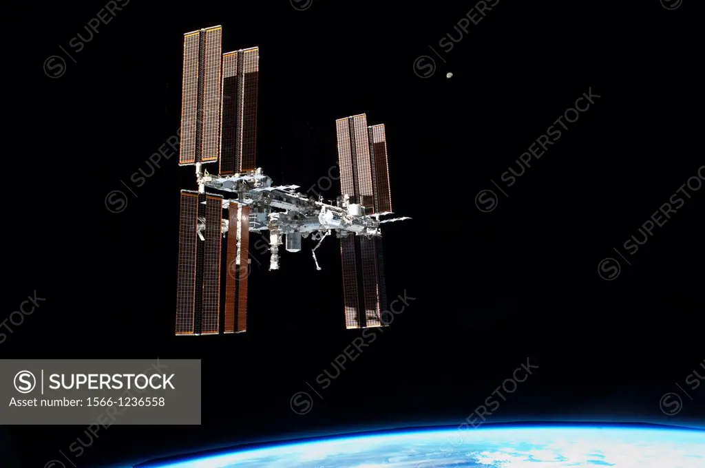 S135-E-011814 19 July 2011 --- This picture of the International Space Station was photographed from the space shuttle Atlantis as the orbiting comple...