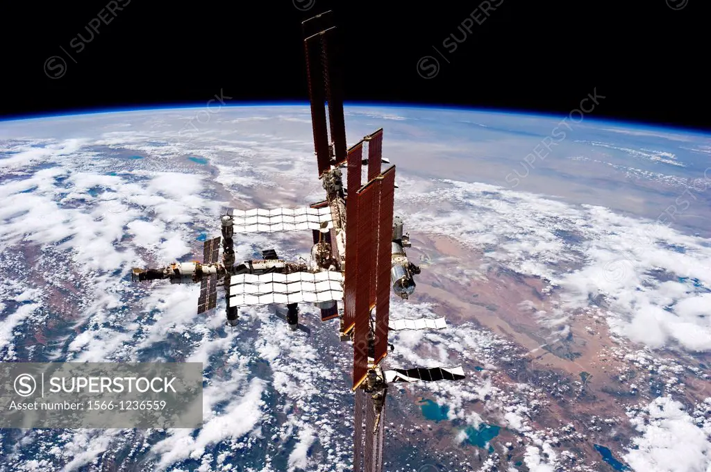 S135-E-011867 19 July 2011 --- This picture of the International Space Station was photographed from the space shuttle Atlantis as the orbiting comple...