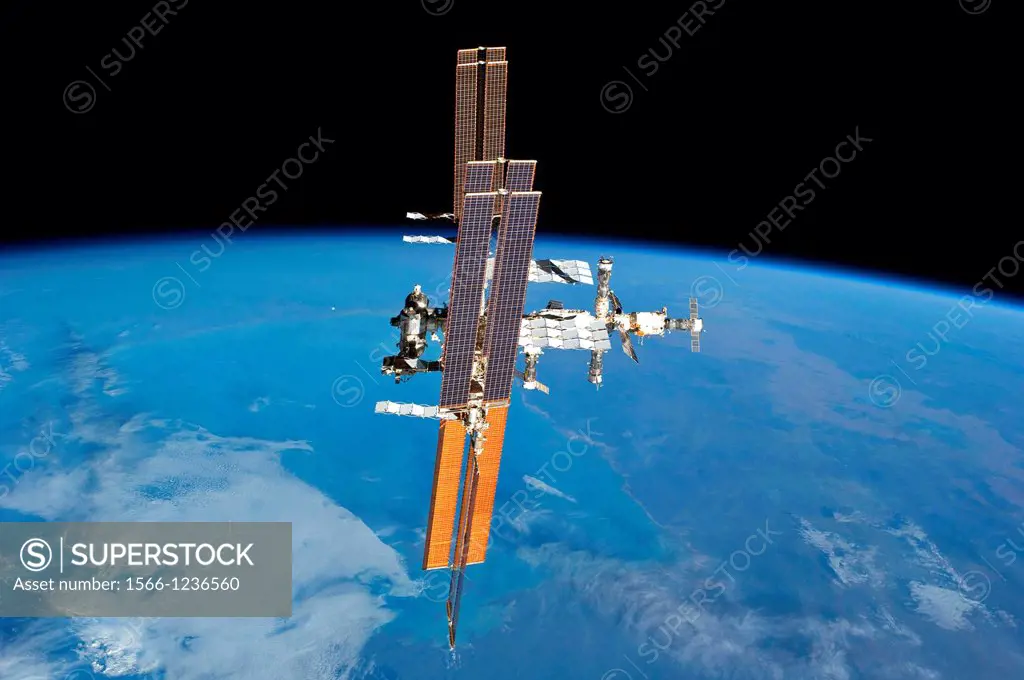 S135-E-011914 19 July 2011 --- This picture of the International Space Station was photographed from the space shuttle Atlantis as the orbiting comple...