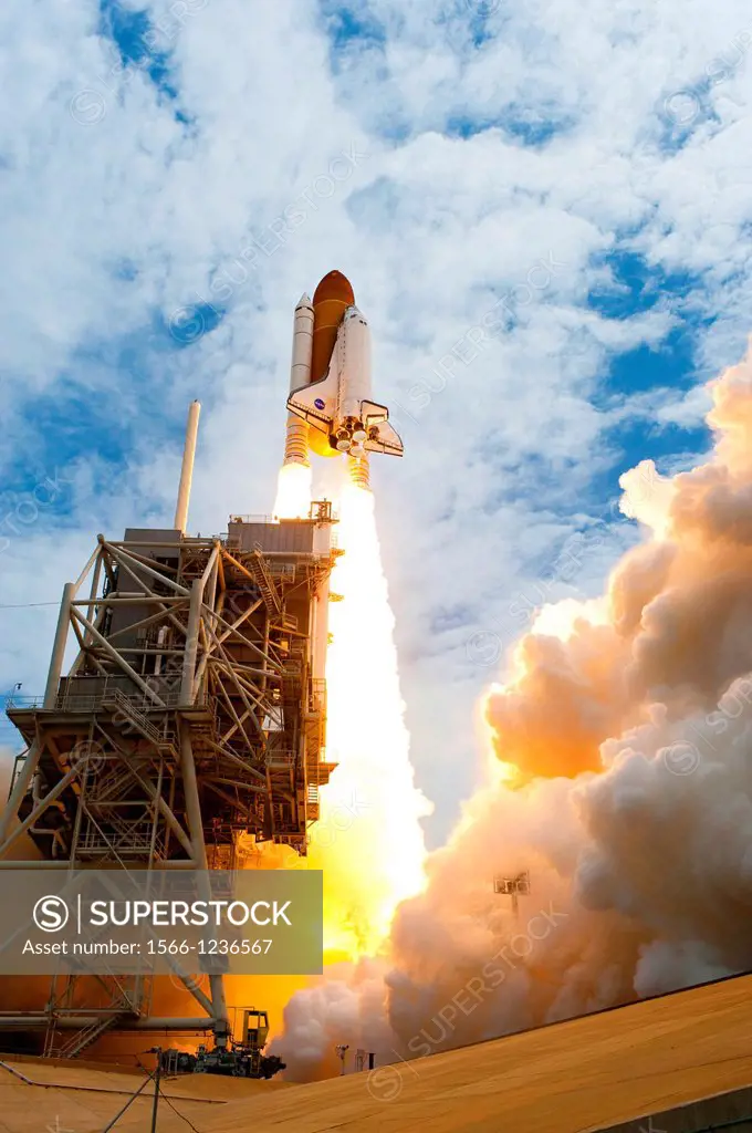 CAPE CANAVERAL, Fla  -- At NASA´s Kennedy Space Center in Florida, space shuttle Atlantis´ main engines and solid rocket boosters ignite on Launch Pad...