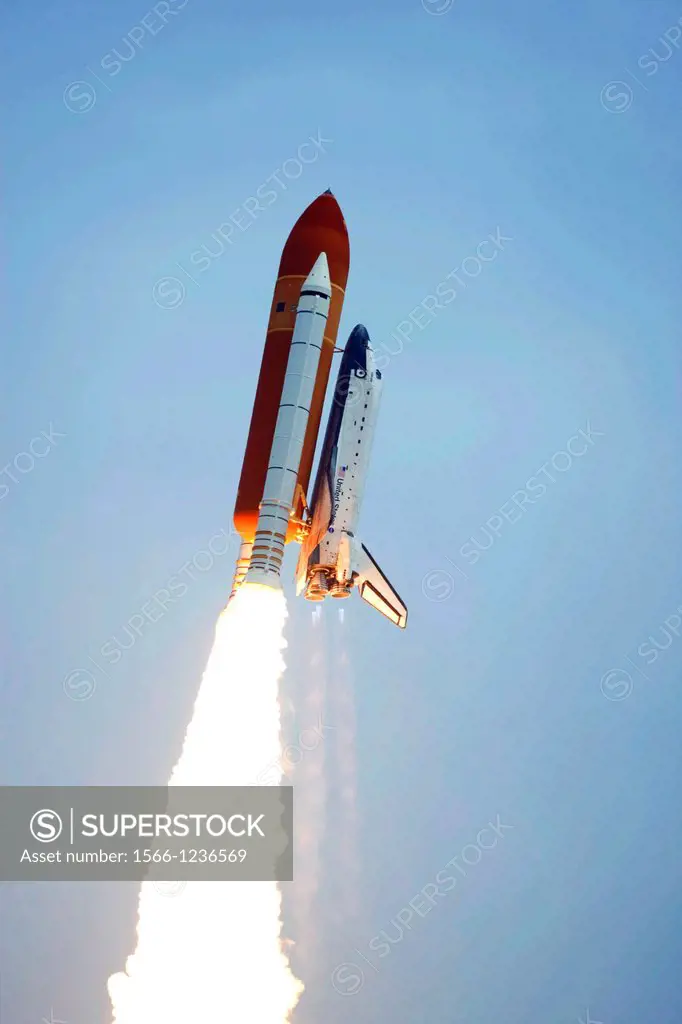 CAPE CANAVERAL, Fla  -- Space shuttle Atlantis completes its roll program moments after liftoff from Launch Pad 39A at NASA´s Kennedy Space Center in ...