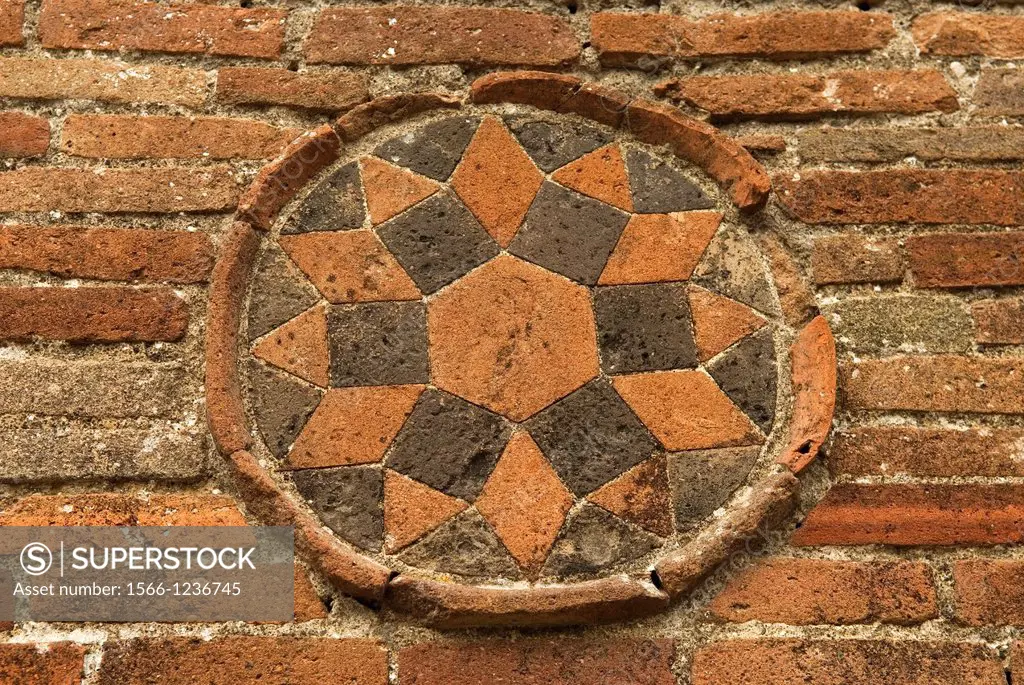 symbol on a wall of the archeological site of Pompeii, province of Naples, Campania region, southern Italy, Europe