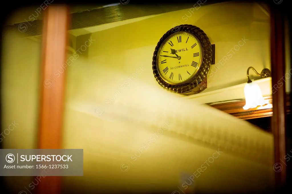 office clock through a window