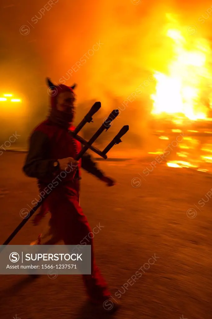´Correfoc´, typical catalan celebration in which devils armed with fireworks dance through the streets. San Antonio festival, Villafranca del Cid, Cas...
