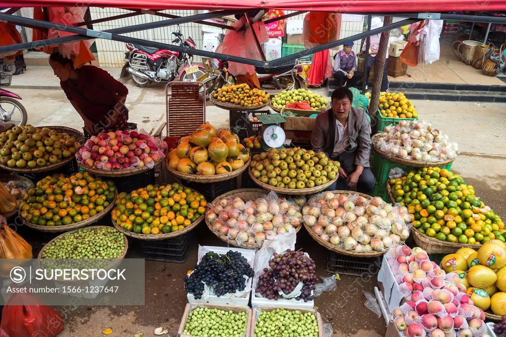 China, Yunnan Province, Kunming Municipality, Dongchuan District, Niujie village, local market, fruits