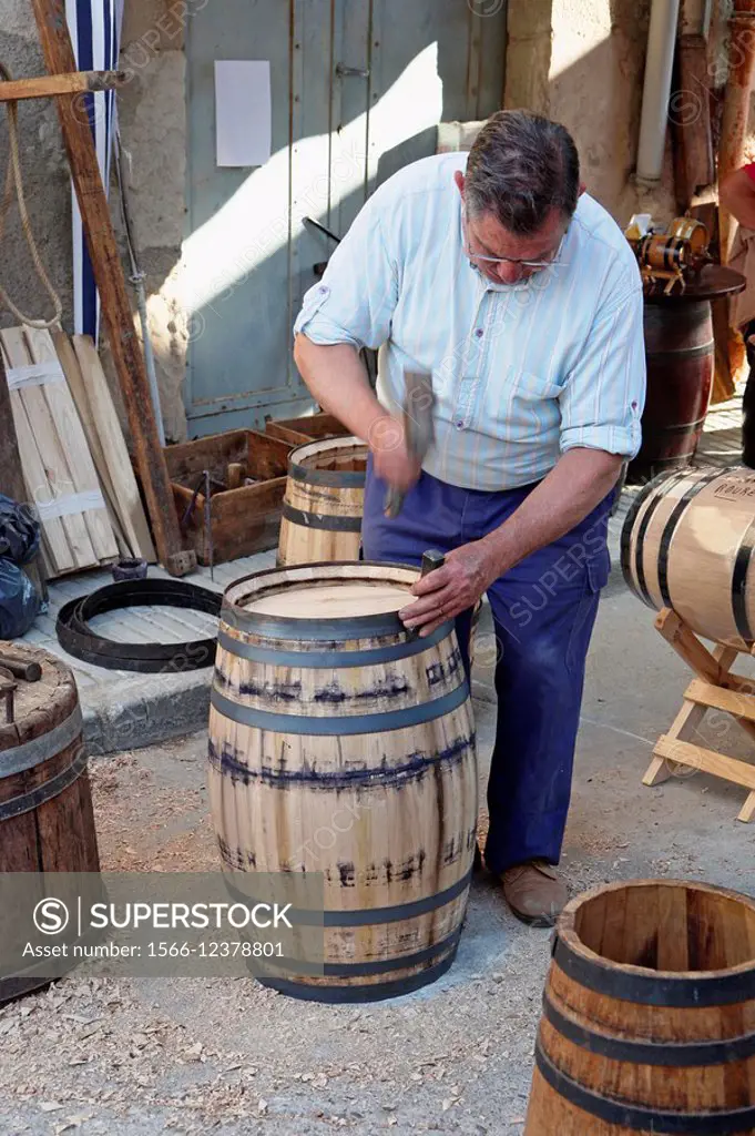 Craftsman working at a barrel