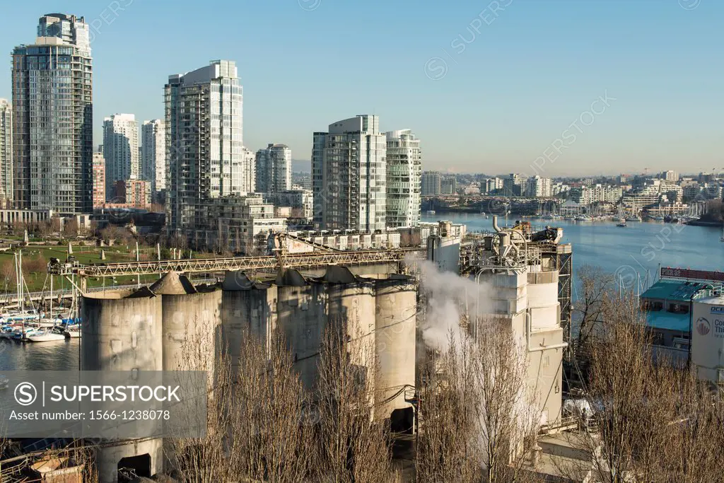 concrete facility on Granville Island with downtown in the background, Vancouver, BC, Canada