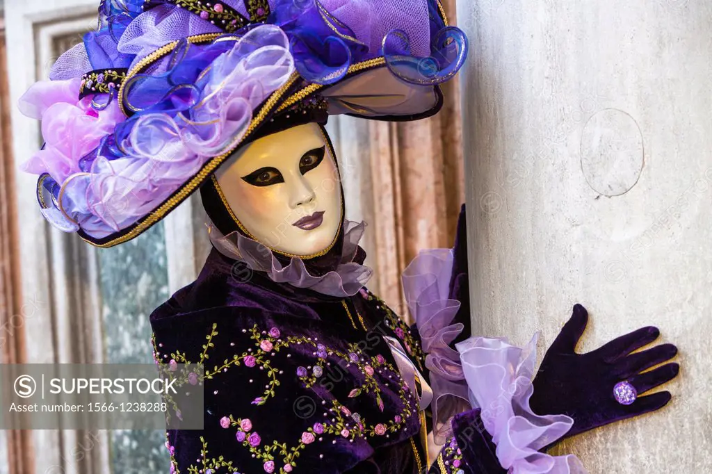 A masked woman at the carnival in Venice, Italy, Europe