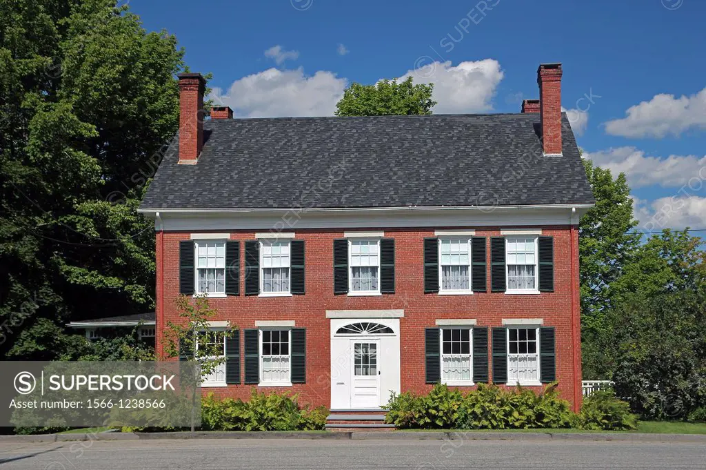 A brick home in the town of Belfast, Maine