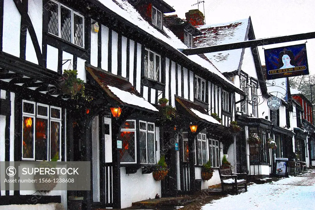 The mediaeval pub ´The Queen´s Head´ in Pinner High Street in north-west London, after Winter snowfall