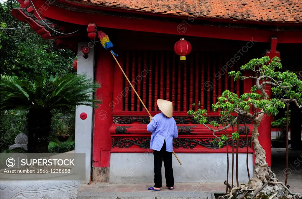 Vietnam, Woman cleaning the temple of Literature in Hanoi