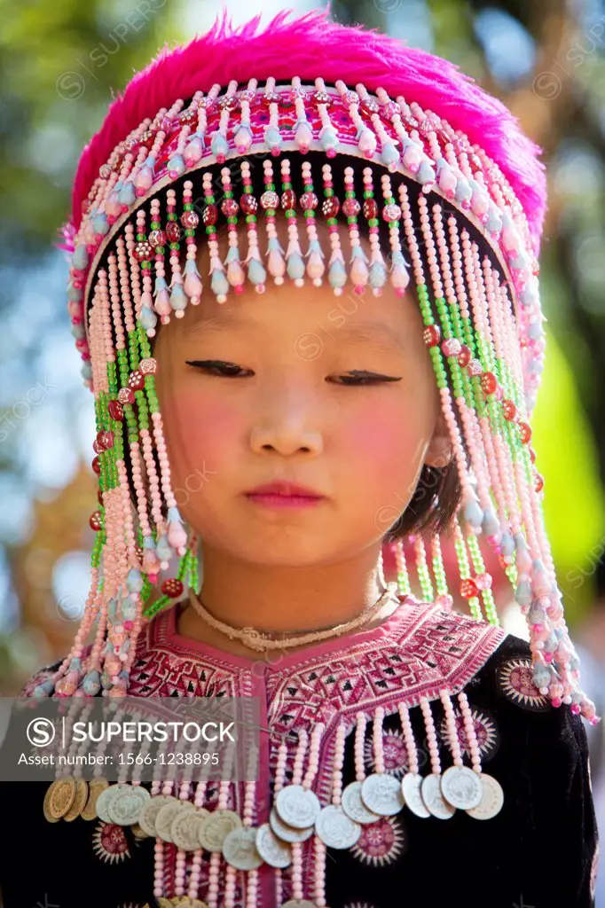Young Thai girl from the Meo tribe in Doi Suthep temple in Chiang Mai Thailand