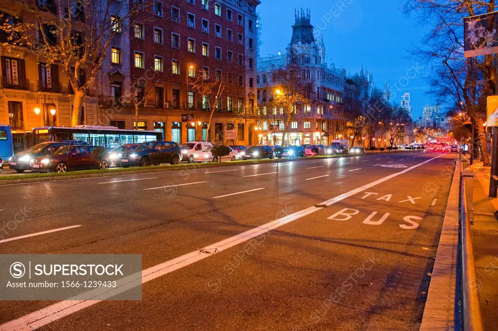 Taxi and bus lane, night view. Alcala street, Madrid, Spain.