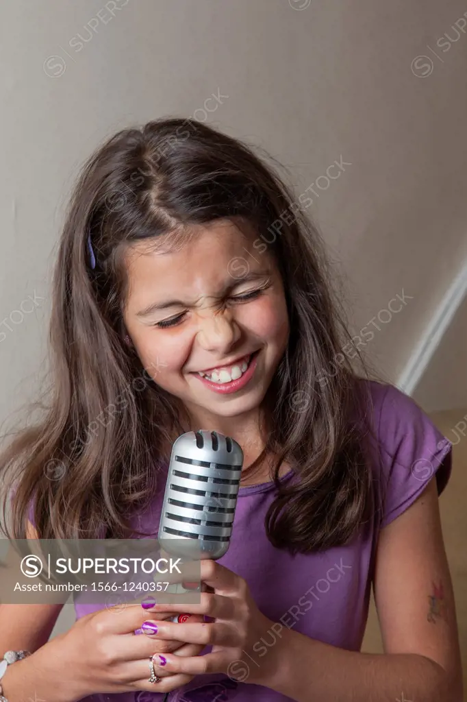 Young girl singing karaoke