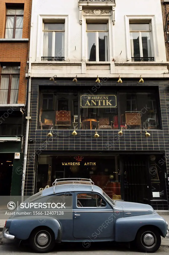 Classic car and Wahrens Antiques shop, Marolles district, Brussels, Belgium, Europe.