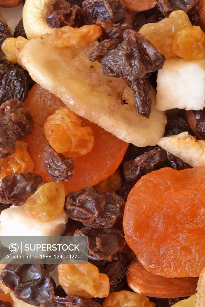 Healthy snacks: bowl of various dried fruits. Closeup.