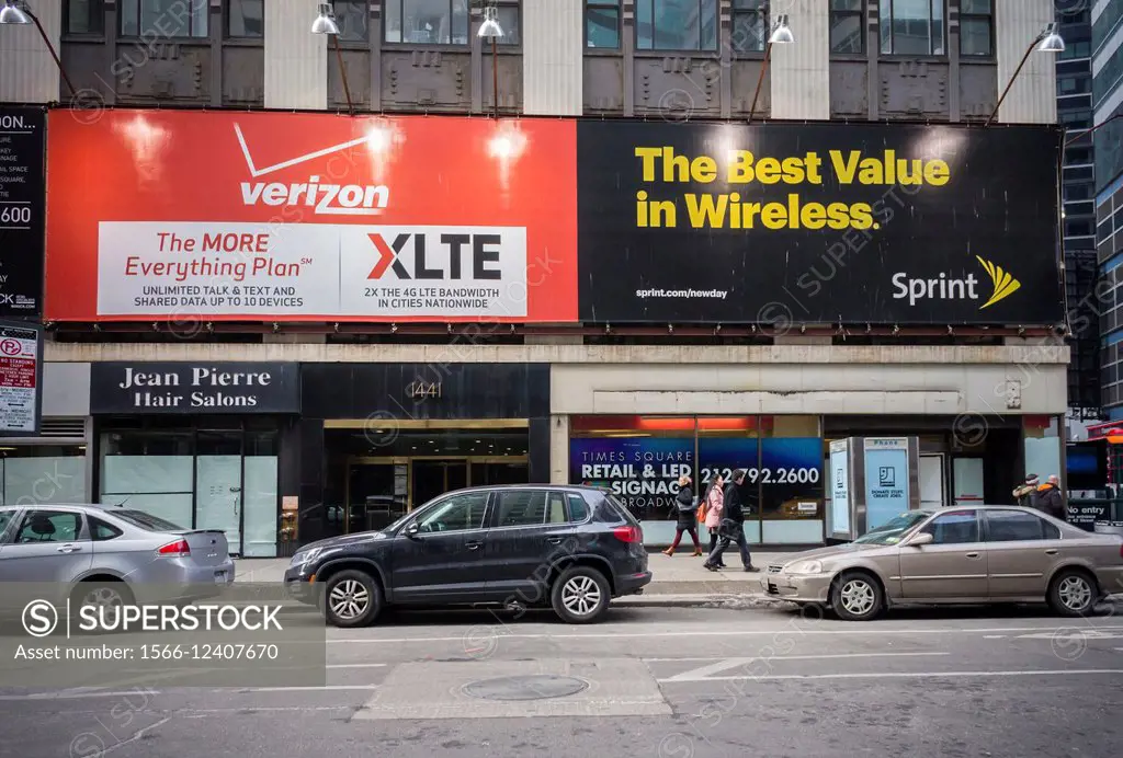 Advertising for Verizon and Sprint wireless services next to each other in New York