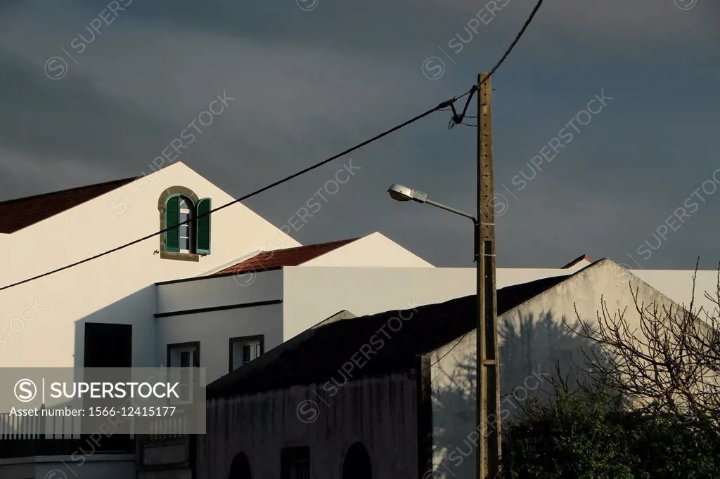 Houses and a street light in Candelaria village. Sao Miguel island, Azores, Portugal.