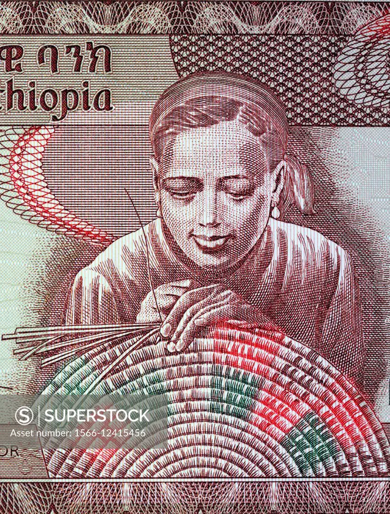Woman weaving basket from 10 birr banknote, Ethiopia, 2008.