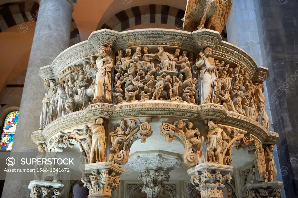 Medieval relief sculpturs on the pulpit in the interior of the Duomo, Pisa, Italy