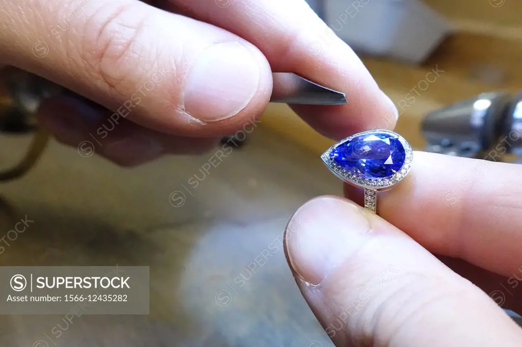 Jeweler working on a saphire for a wedding ring, Stockholm, Sweden