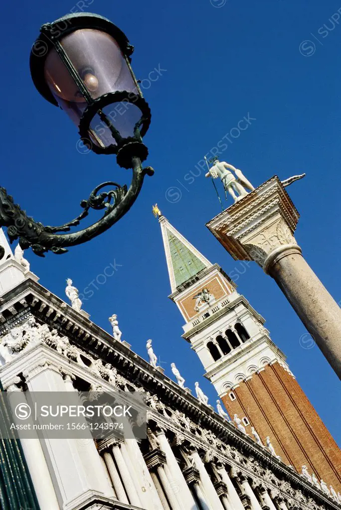 Venice  Italy  The campanile of Basilica di San Marco & statue of St Theodore atop his granite column