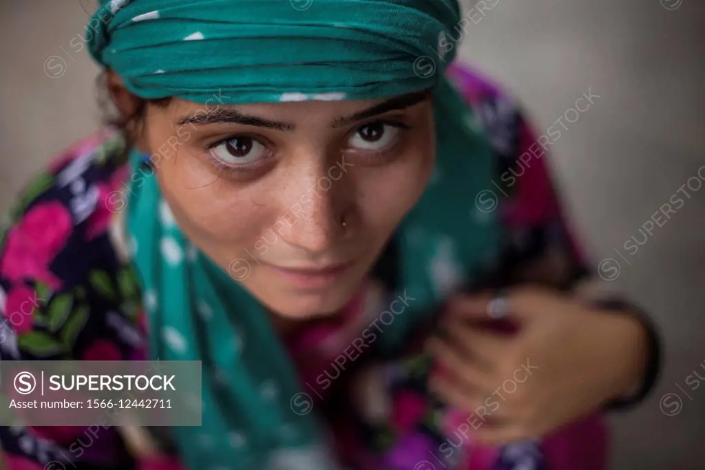 Portrait of a girl in a slum in Balasinor, India.