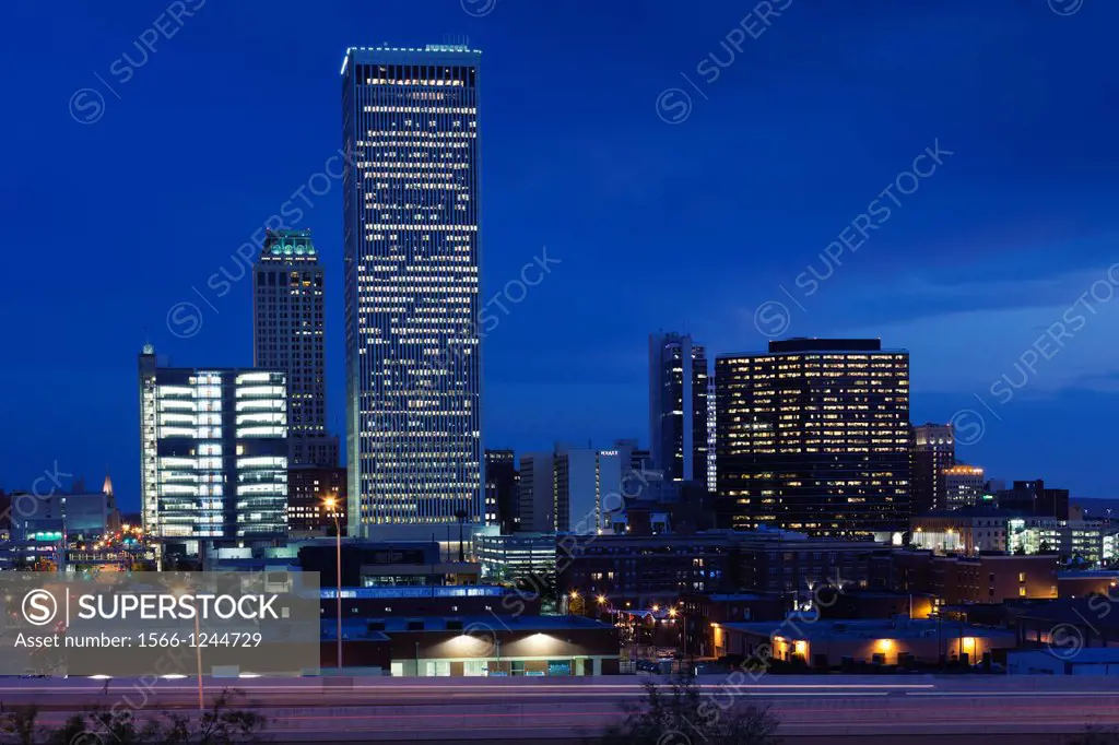 USA, Oklahoma, Tulsa, city skyline from highway I-244, dusk