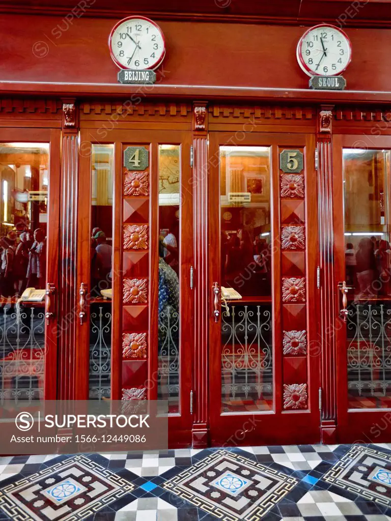 Traditional telephone booths. Central Post Office, Ho Chi Minh City, Vietnam.