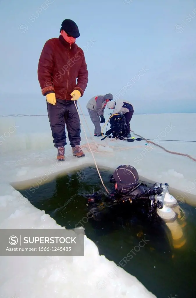 Divers, preparing for subglacial diving, ice diving, in the frozen Black Sea, a rare phenomenon, Odessa, Ukraine, Eastern Europe