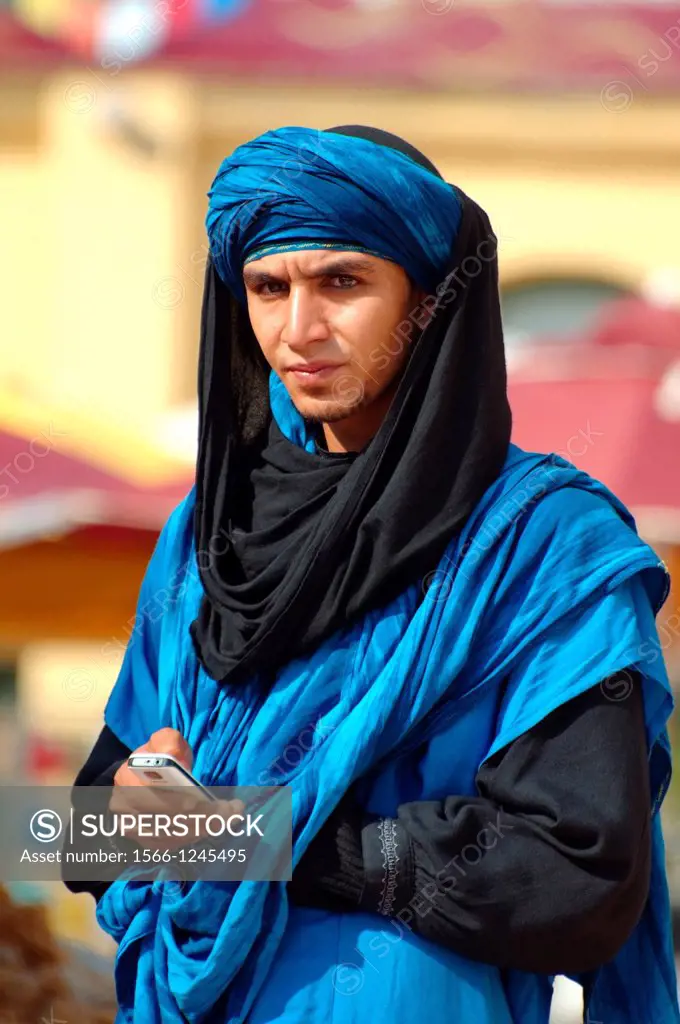 Bedouin man with mobile phone, Tunisia, Africa