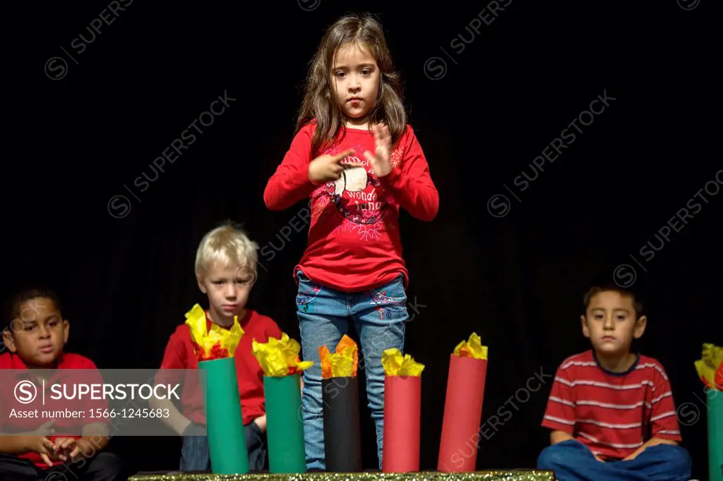 Deaf children act out a skit in sign language during a Christmas pageant at the California School for the Deaf in Riverside, CA