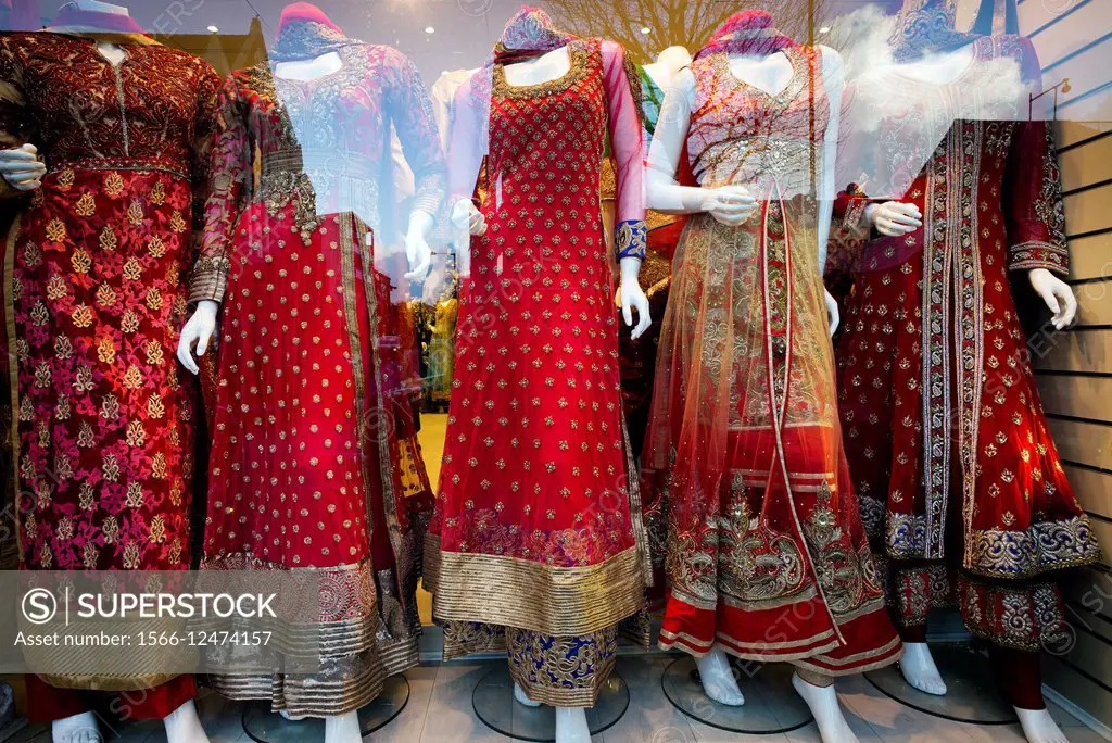 Fancy indian dresses in a indian shop in Bethnal Green Road, East London, England, UK, Europe.