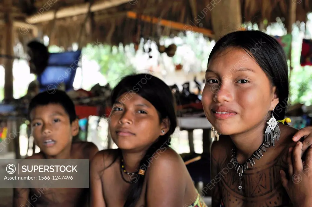 Esilda and her friends, young teenagers of Embera native community living by the Chagres River within the Chagres National Park, Republic of Panama, C...