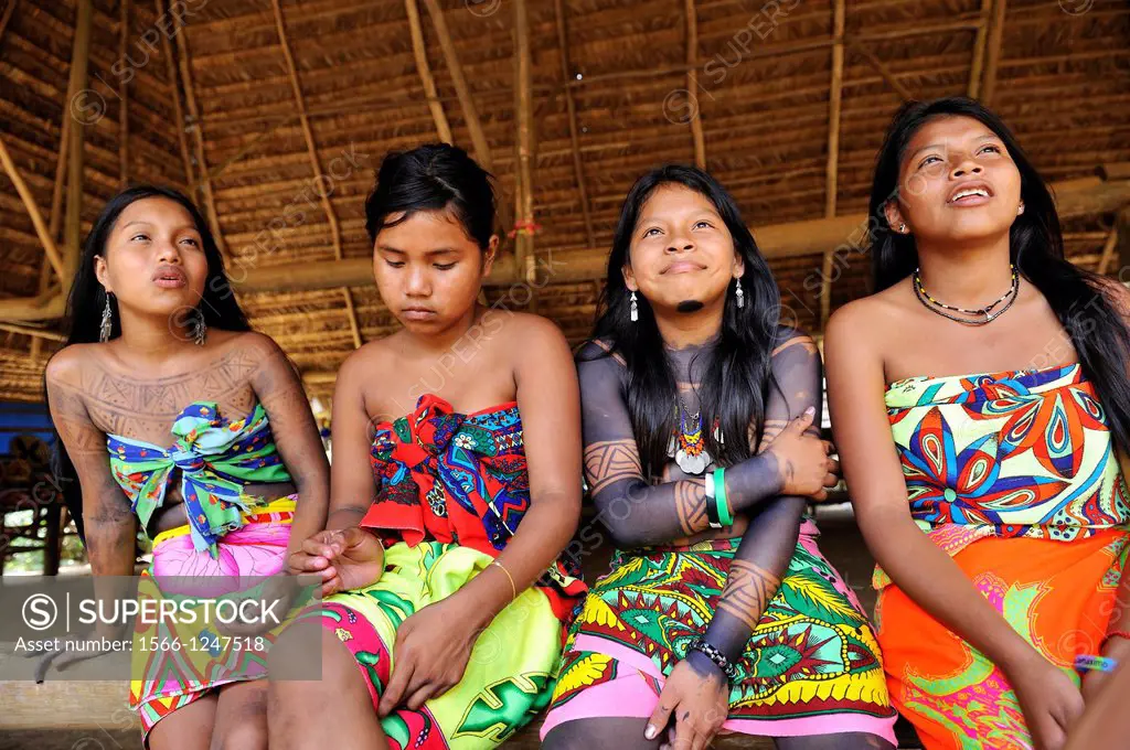 Esilda on left and her friends, young teenagers of Embera native community living by the Chagres River within the Chagres National Park, Republic of P...