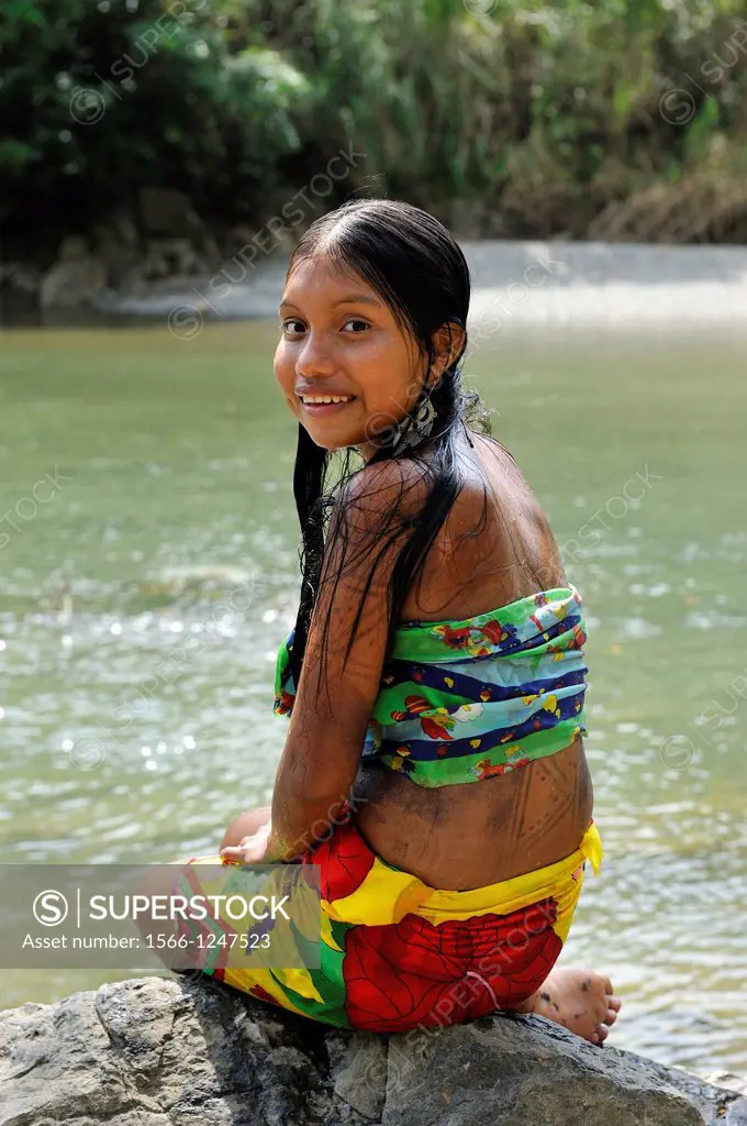 Esilda by the river, young teenager of Embera native community living by the Chagres River within the Chagres National Park, Republic of Panama, Centr...
