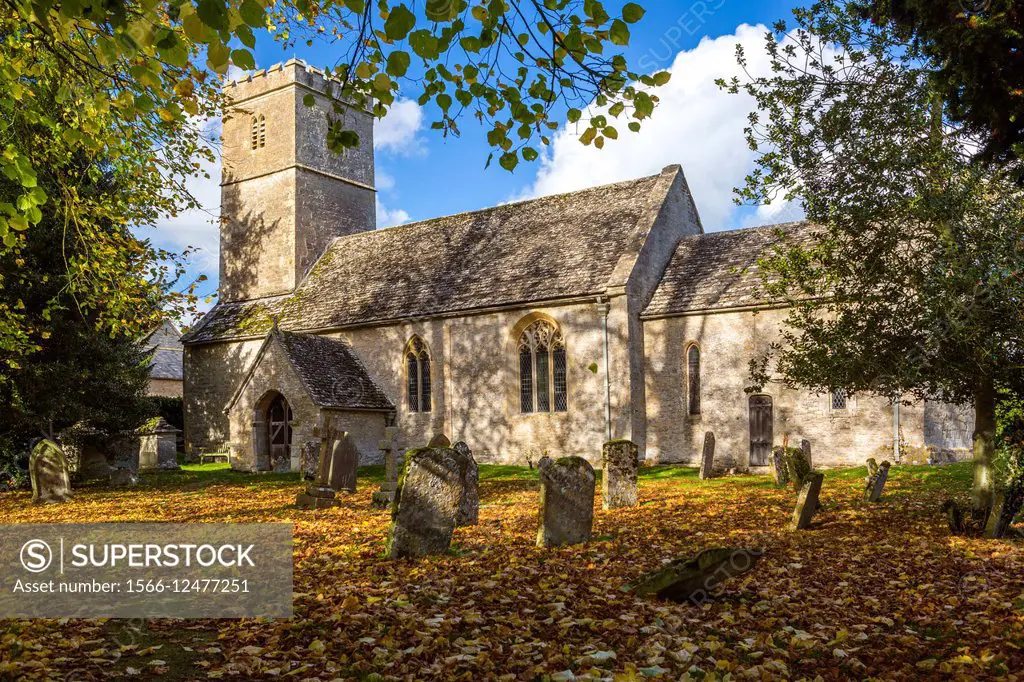 The Parish Church of St Andrew with the churchyard in the Cotswold village of Coln Rogers, Gloucestershire, England, United Kingdom, Europe.