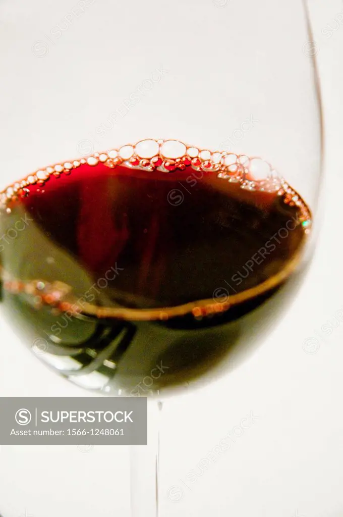 Glass of red wine. Close view.