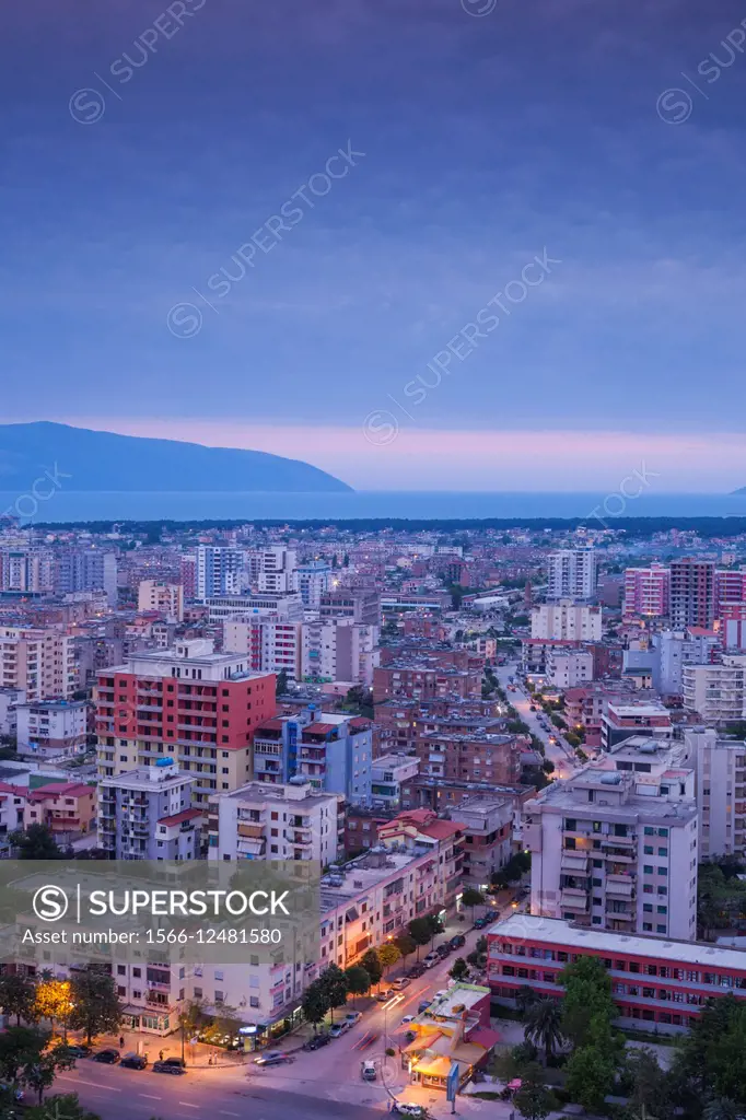 Albania, Vlora, elevated city view, dusk.