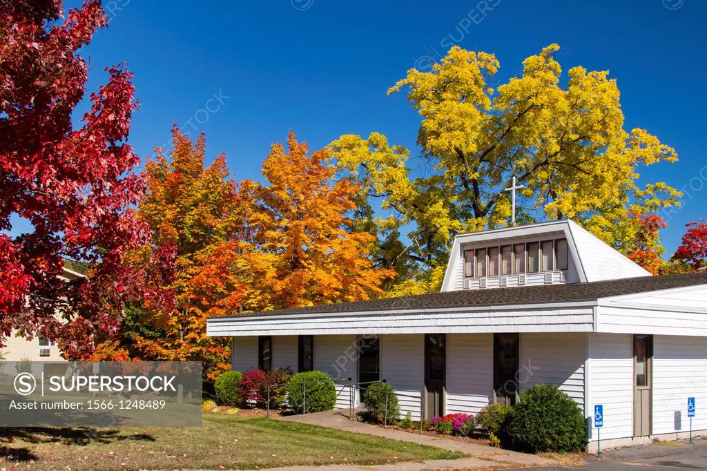 The Faith Baptist Church with fall foliage color in Bayfield, Wisconsin, USA