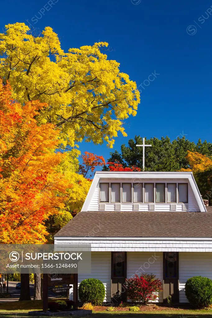 The Faith Baptist Church with fall foliage color in Bayfield, Wisconsin, USA